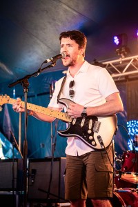 Michael Henry singing at the Isle of Wight Festival 2025