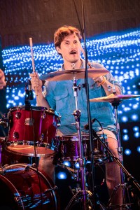 Adam Hollick playing drums at the Isle of Wight Festival 2025